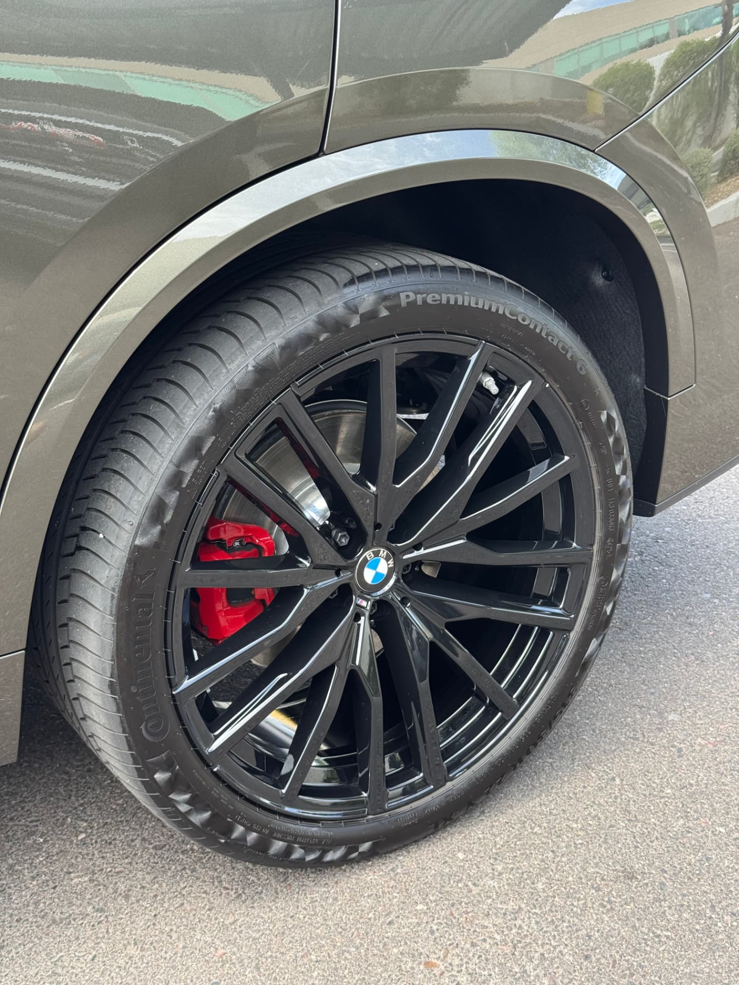 Freshly detailed BMW wheel with red brake caliper